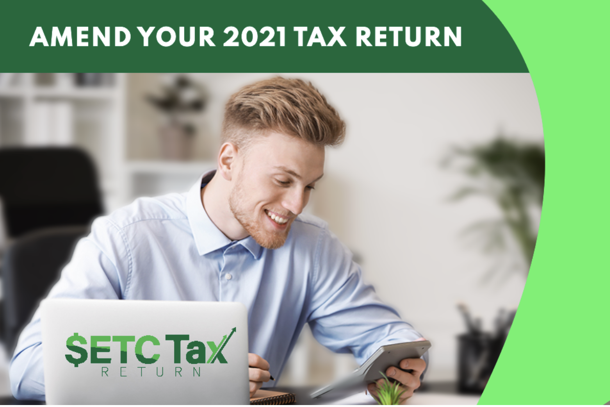 An accountant using a calculator to amend his 2021 IRS refund using the SETC credit